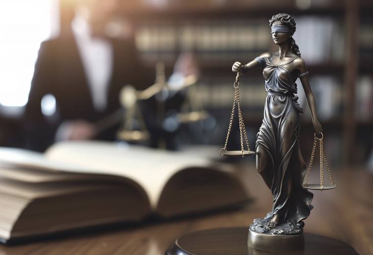 Scales of justice on a desk in a law office